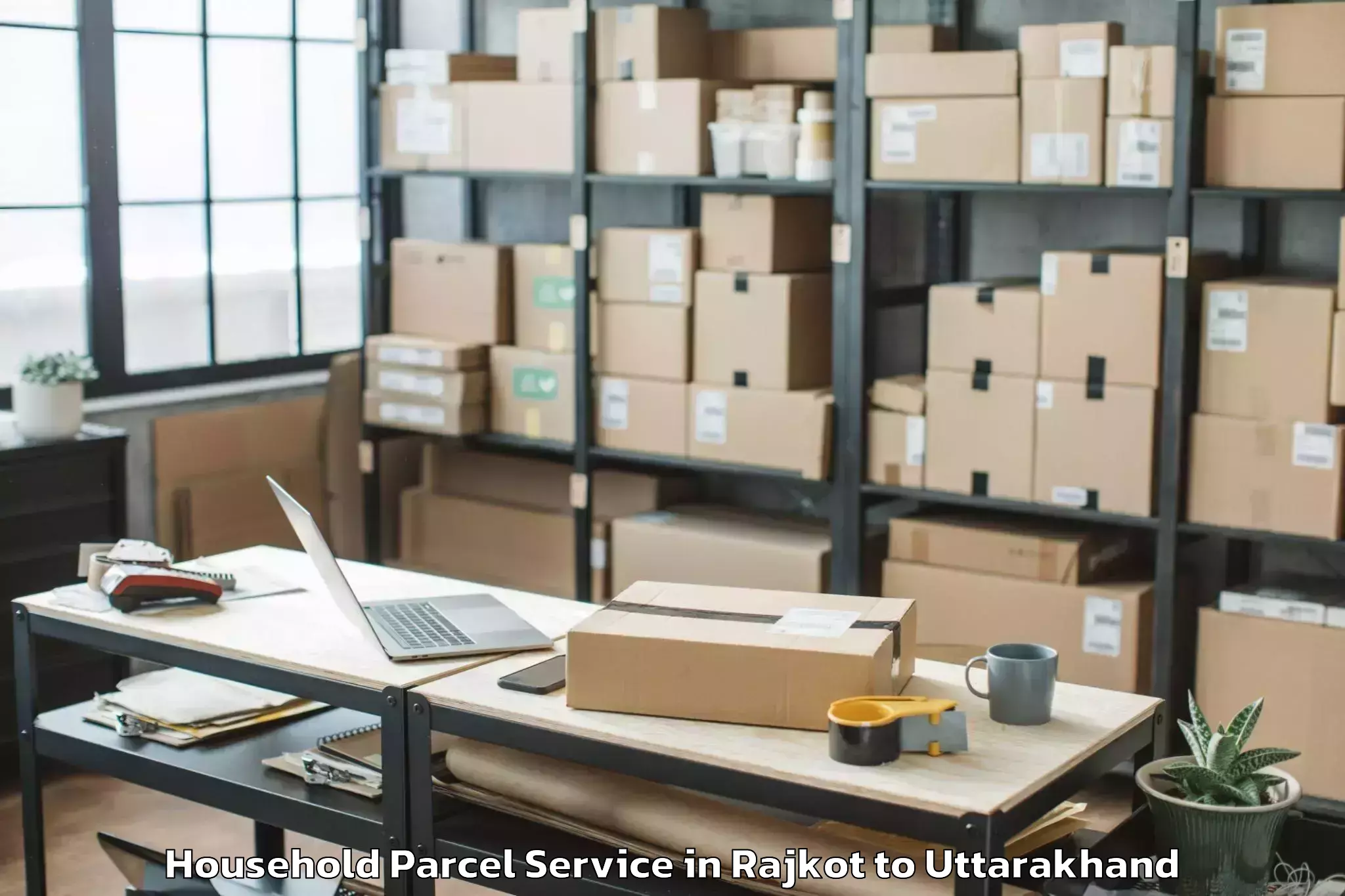 Hassle-Free Rajkot to Dhoomakot Household Parcel